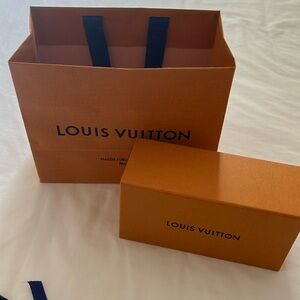 bag and sunglasses box